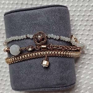 HENRI BENDEL 3 STRAND CRYSTAL CHARM BRACLET/TOGGLE CLOUSURE IN WHITE &GOLD